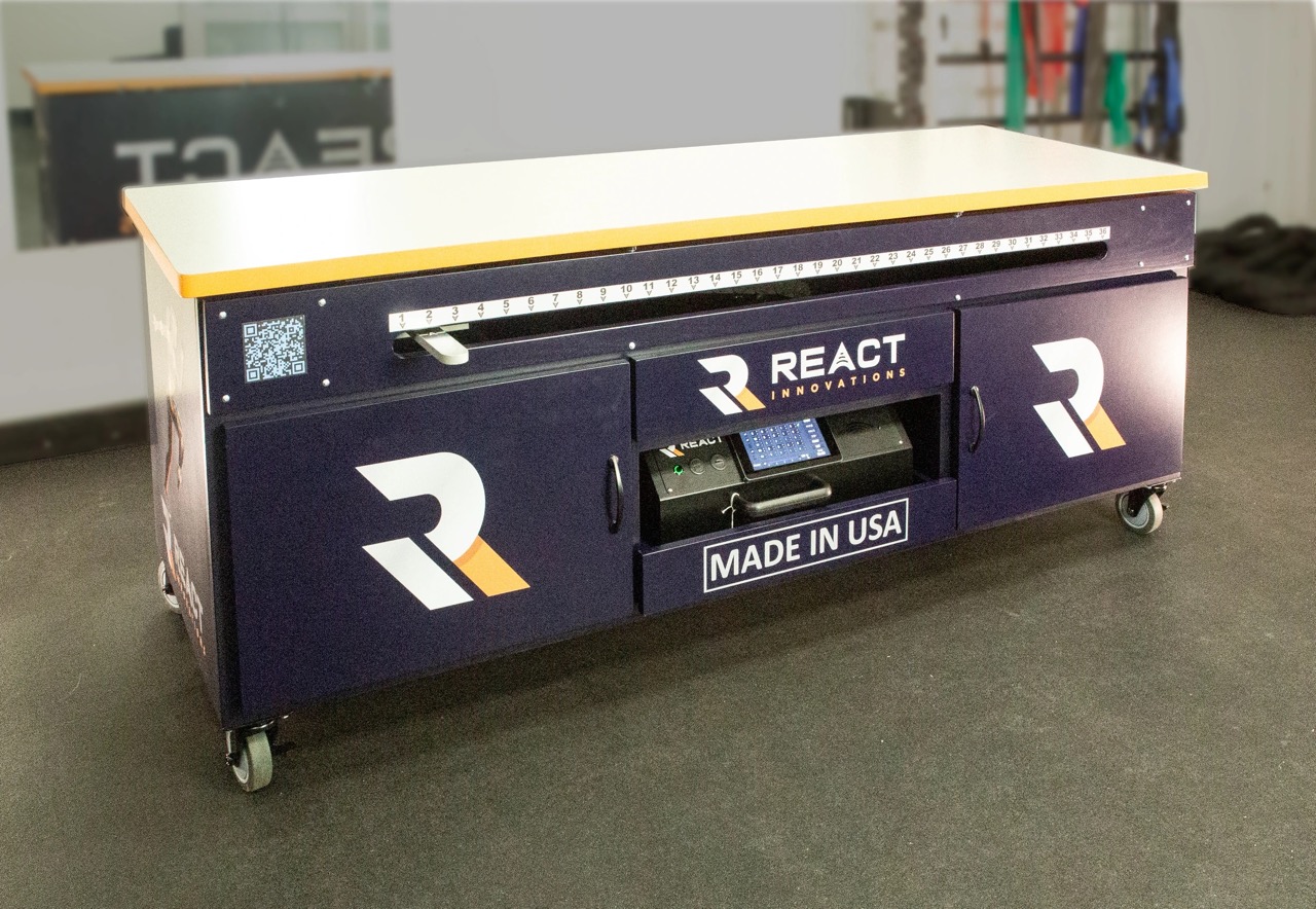 REACT Table for neuromuscular stimulation therapy and post-surgery recovery